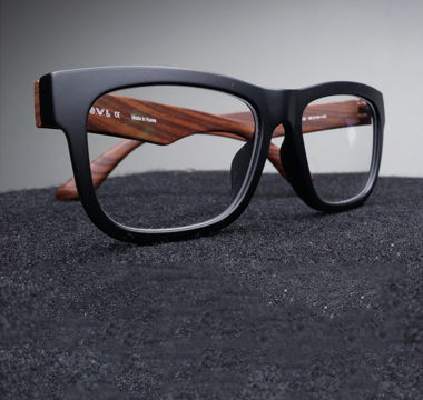 Folded pair of black rimmed glasses