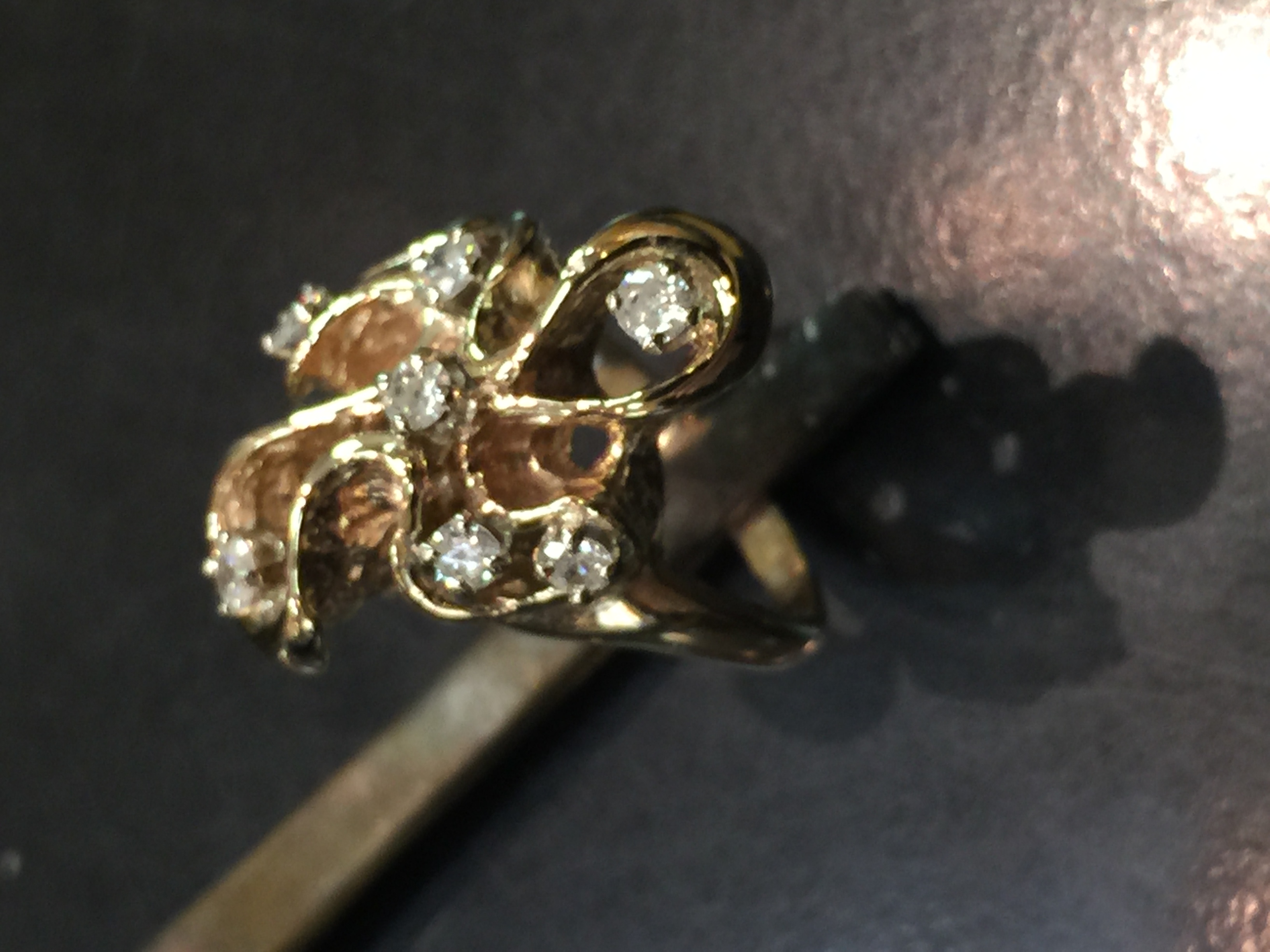 Gold ring with several diamonds