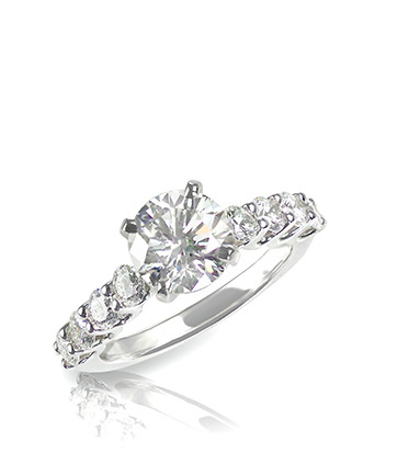 Engagement ring with diamond centre stone and smaller diamonds around the band